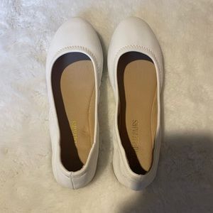 White ballet flats